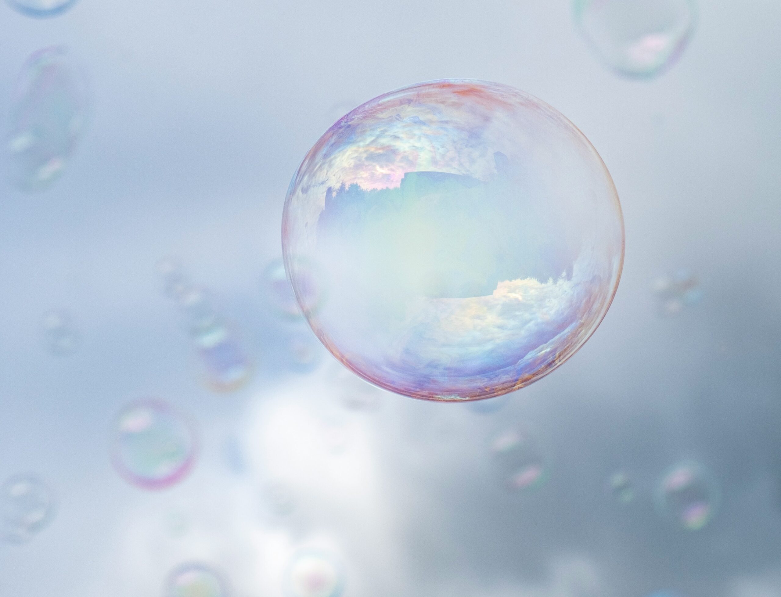 A close-up picture of a bubble in the sky.